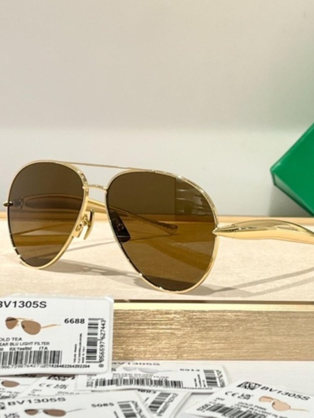 Bottega Veneta Gold Aviator Sunglasses